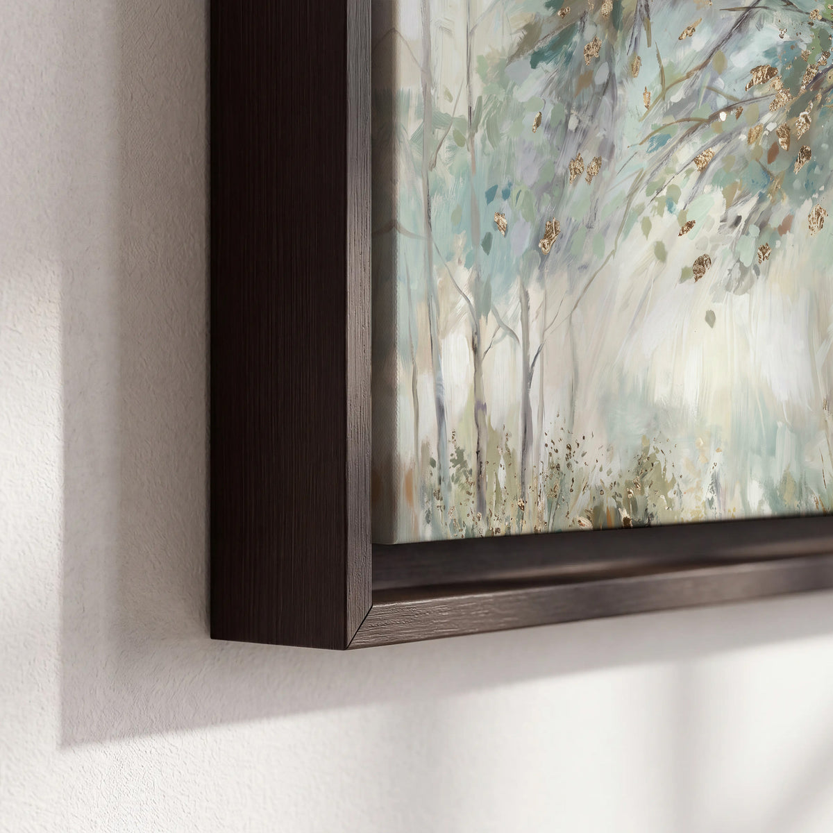 Slender woodland trunks and delicate branches in soft green and cream 3 piece framed canvas wall art material and edge close up