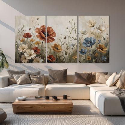 Rust red, pale blue and ivory flowers with delicate meadow stems set of 3 poster prints displayed in a living room