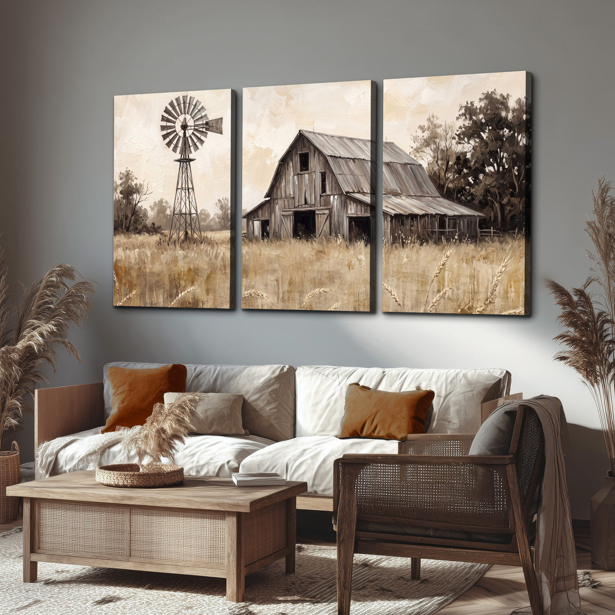 A weathered wooden barn and windmill in a golden country field 3 piece canvas wall art displayed in a rustic living room