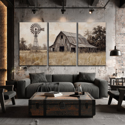 A weathered wooden barn and windmill in a golden country field 3 piece canvas wall art displayed in a industrial room