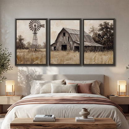 A weathered wooden barn and windmill in a golden country field 3 piece framed canvas wall art displayed in a bedroom