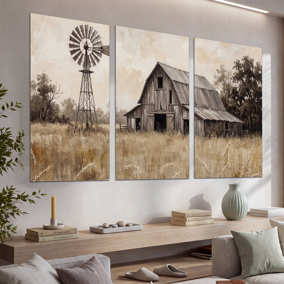 A weathered wooden barn and windmill in a golden country field set of 3 poster prints displayed in a console