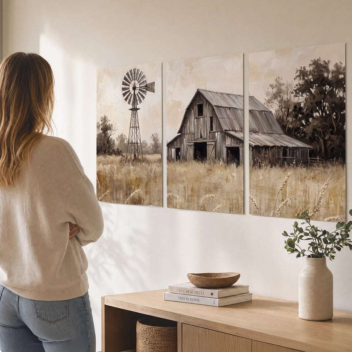 A weathered wooden barn and windmill in a golden country field set of 3 poster prints three panel arrangement on a wall