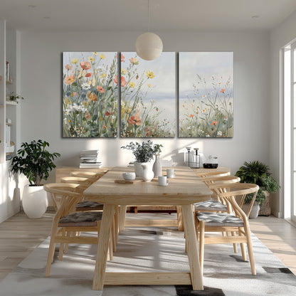 Small colorful wildflowers and light grasses beside a pale lake 3 piece canvas wall art room and product view