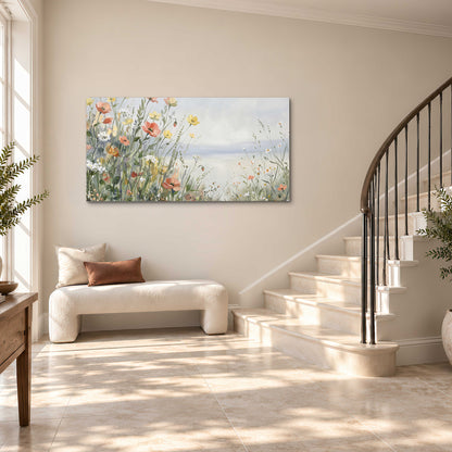 Small colorful wildflowers and light grasses beside a pale lake single canvas wall art styled in an interior