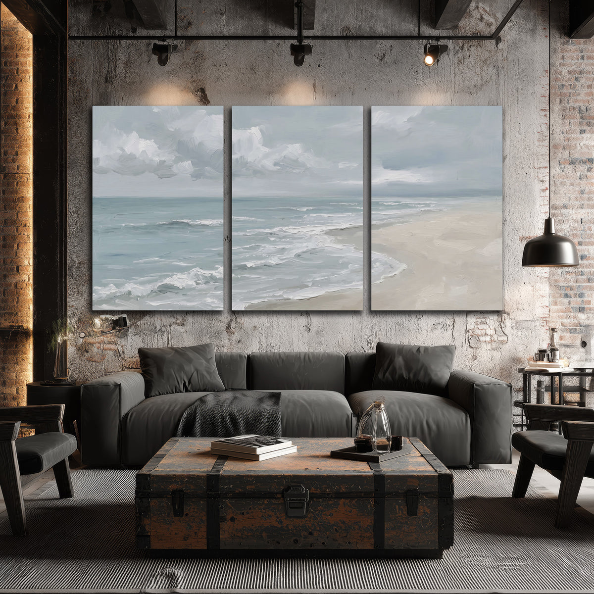 Gentle pale blue waves washing across a light sandy beach 3 piece canvas wall art displayed in a industrial room
