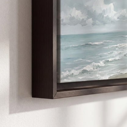 Gentle pale blue waves washing across a light sandy beach 3 piece framed canvas wall art material and edge close up