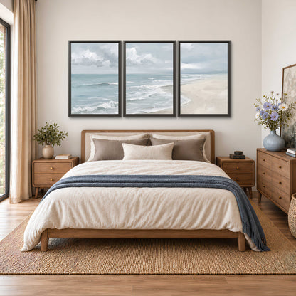 Gentle pale blue waves washing across a light sandy beach 3 piece framed canvas wall art styled in an interior