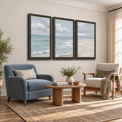 Gentle pale blue waves washing across a light sandy beach 3 piece framed canvas wall art styled in an interior