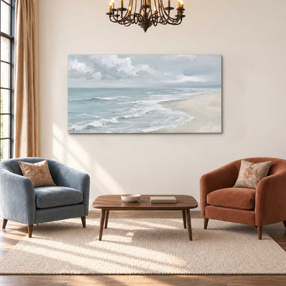 Gentle pale blue waves washing across a light sandy beach single canvas wall art styled in an interior