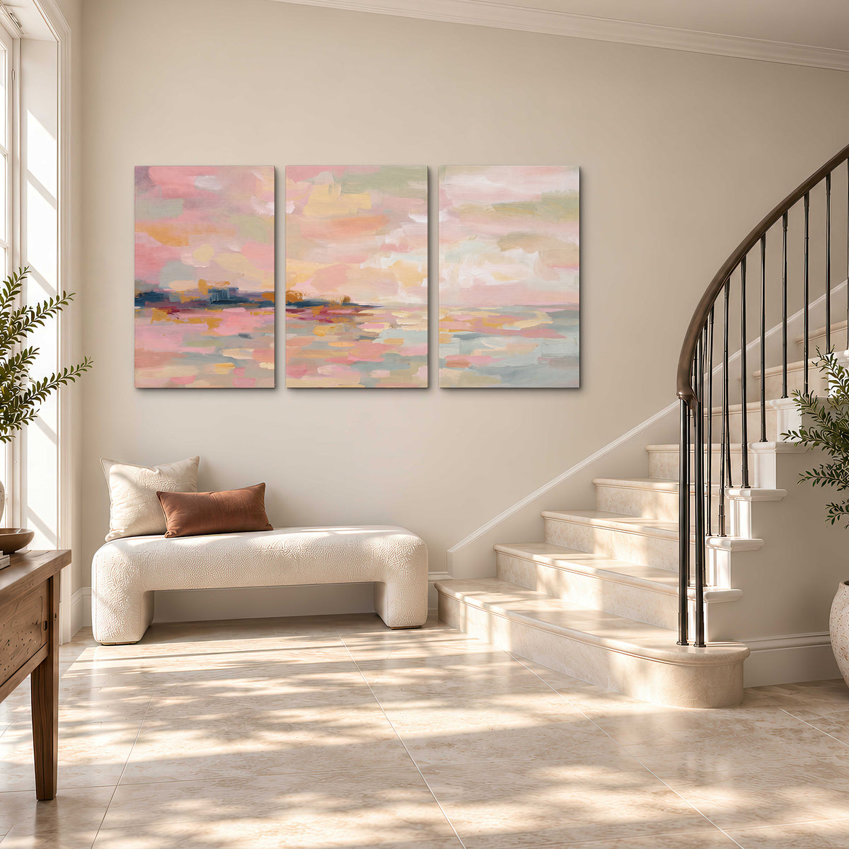 Pink, peach and yellow painted-style sky and water reflections 3 piece canvas wall art styled in an interior