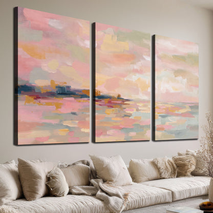 Pink, peach and yellow painted-style sky and water reflections 3 piece canvas wall art room and product view