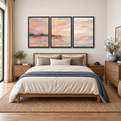 Pink, peach and yellow painted-style sky and water reflections 3 piece framed canvas wall art styled in an interior