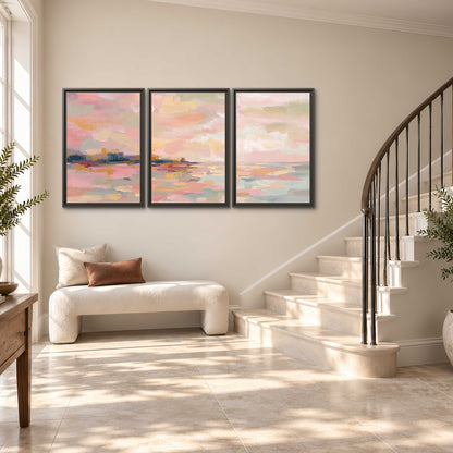 Pink, peach and yellow painted-style sky and water reflections 3 piece framed canvas wall art styled in an interior