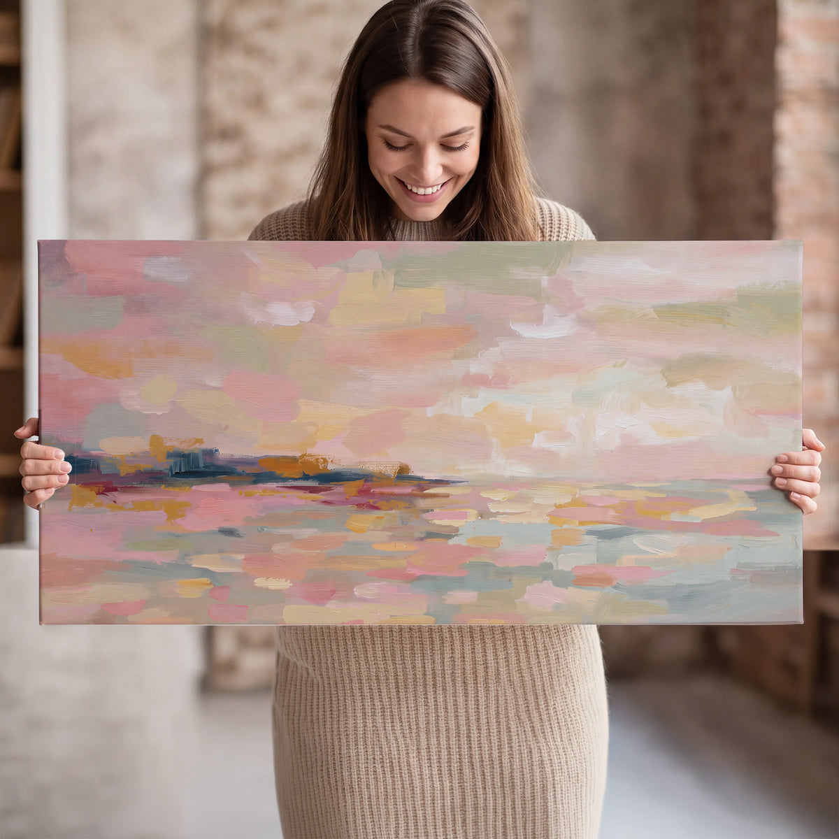 Pink, peach and yellow painted-style sky and water reflections single canvas wall art held in hands