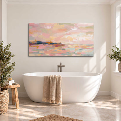 Pink, peach and yellow painted-style sky and water reflections single canvas wall art styled in an interior