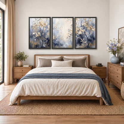 Delicate pale gold-colored branches against a deep blue misty background 3 piece framed canvas wall art styled in an interior