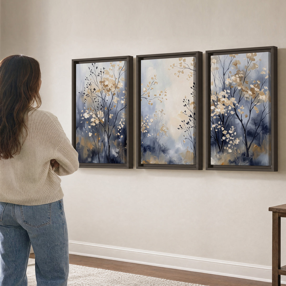 Delicate pale gold-colored branches against a deep blue misty background 3 piece framed canvas wall art three panel arrangement on a wall