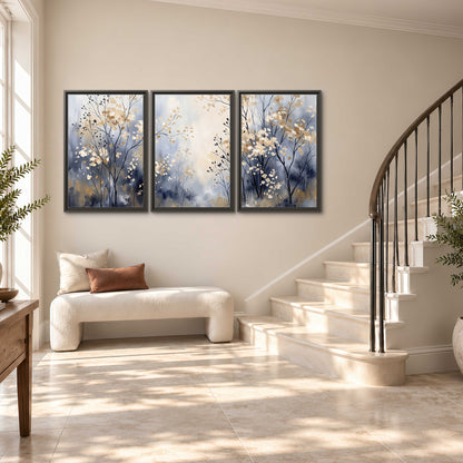 Delicate pale gold-colored branches against a deep blue misty background 3 piece framed canvas wall art styled in an interior