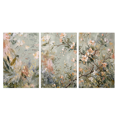 Delicate pink and ivory flowering branches against muted sage green 3 piece canvas wall art viewed straight on