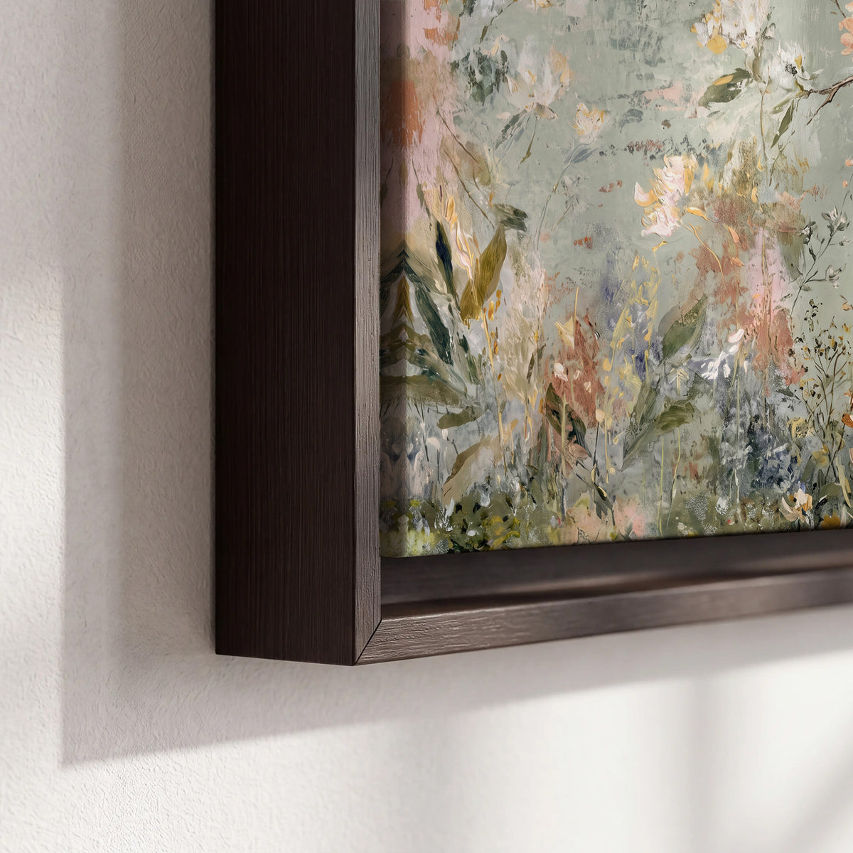 Delicate pink and ivory flowering branches against muted sage green 3 piece framed canvas wall art material and edge close up