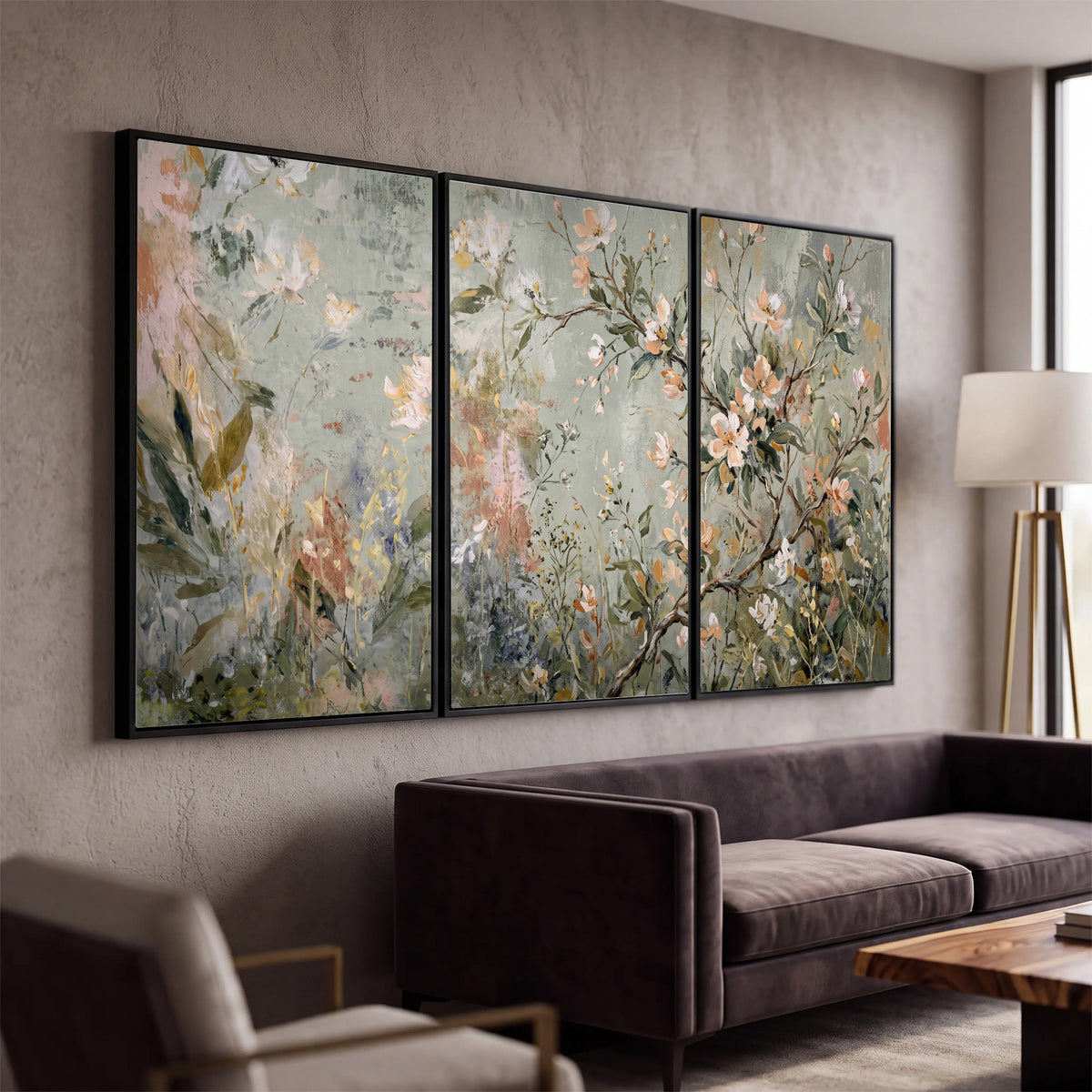 Delicate pink and ivory flowering branches against muted sage green 3 piece framed canvas wall art displayed in a modern living room