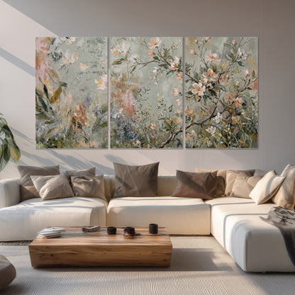 Delicate pink and ivory flowering branches against muted sage green set of 3 poster prints displayed in a living room