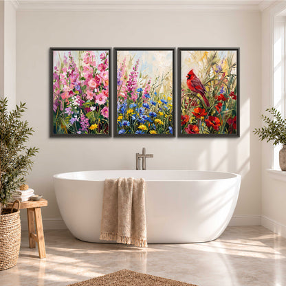 A bright red cardinal among vivid pink, blue and yellow wildflowers 3 piece framed canvas wall art styled in an interior