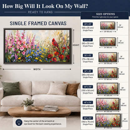 A bright red cardinal among vivid pink, blue and yellow wildflowers single framed canvas wall art size guide above a sofa; room view is illustrative