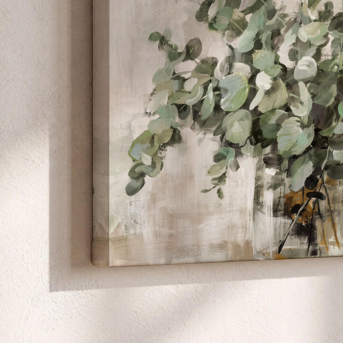 Soft sage eucalyptus leaves and pale stems on a warm cream background 3 piece canvas wall art material and edge close up