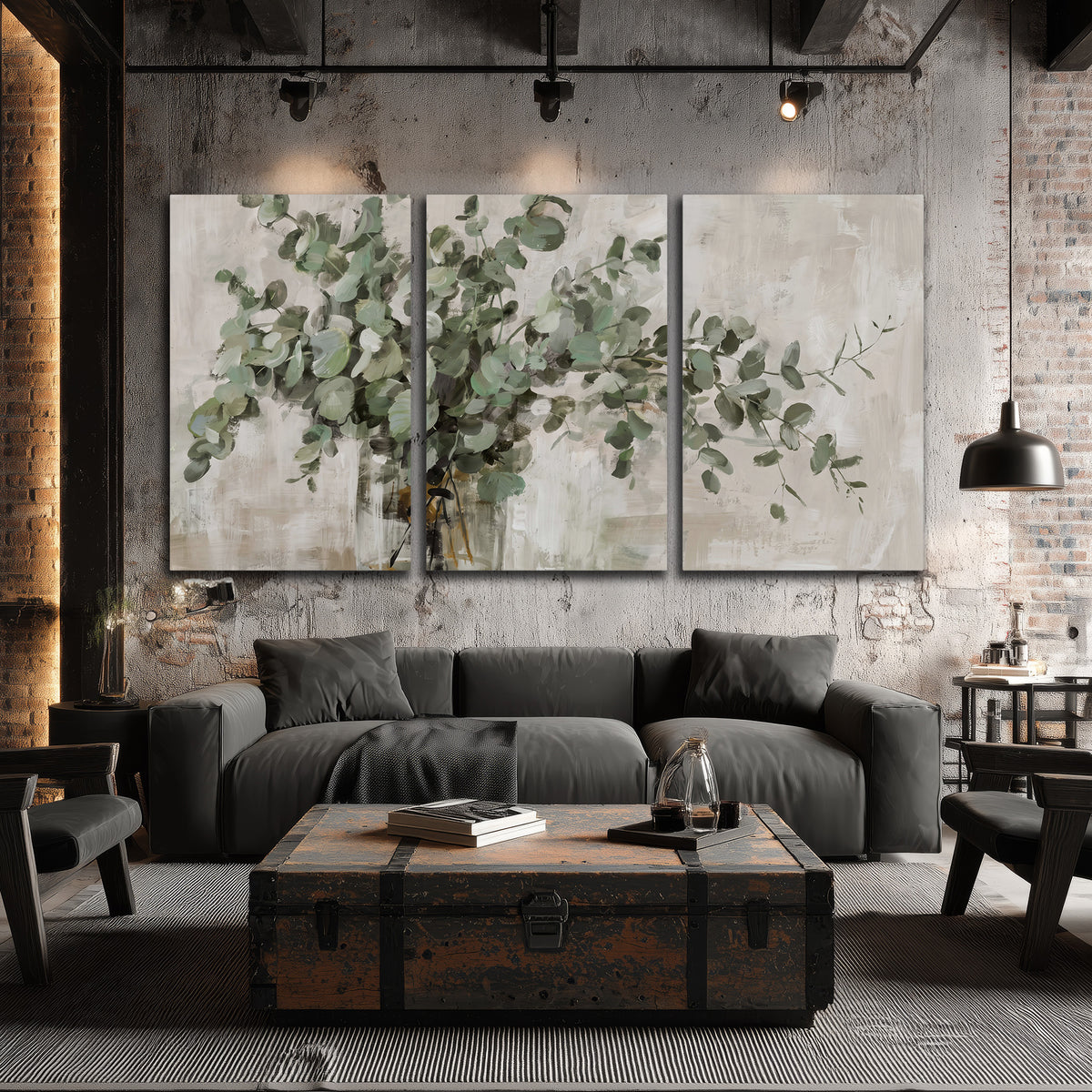 Soft sage eucalyptus leaves and pale stems on a warm cream background 3 piece canvas wall art displayed in a industrial room