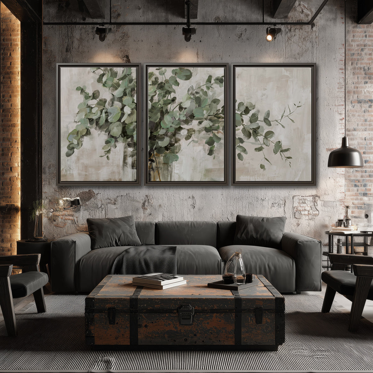 Soft sage eucalyptus leaves and pale stems on a warm cream background 3 piece framed canvas wall art displayed in a industrial room