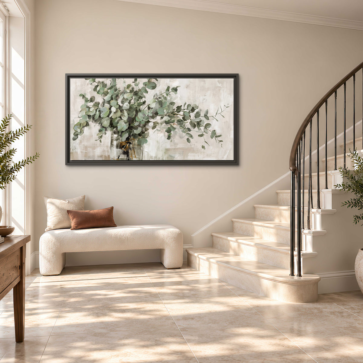 Soft sage eucalyptus leaves and pale stems on a warm cream background single framed canvas wall art styled in an interior