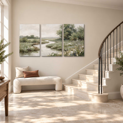A narrow winding stream through quiet green meadows and trees 3 piece canvas wall art styled in an interior