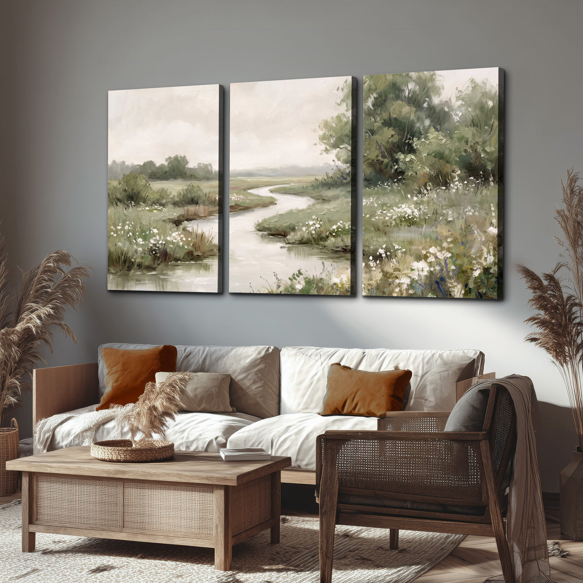 A narrow winding stream through quiet green meadows and trees 3 piece canvas wall art displayed in a rustic living room