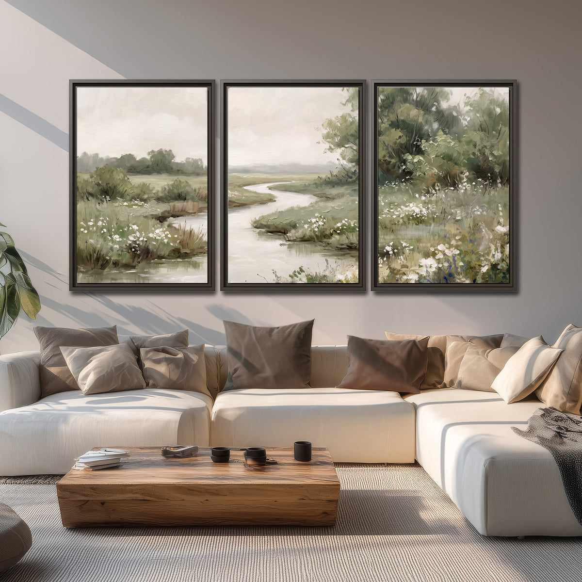 A narrow winding stream through quiet green meadows and trees 3 piece framed canvas wall art displayed in a living room