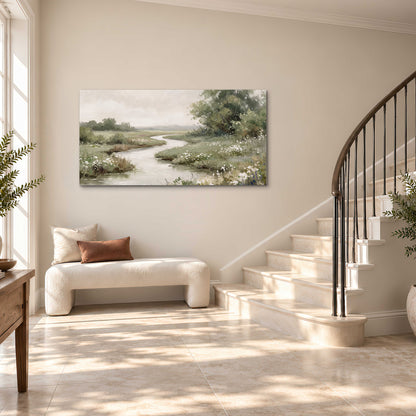 A narrow winding stream through quiet green meadows and trees single canvas wall art styled in an interior