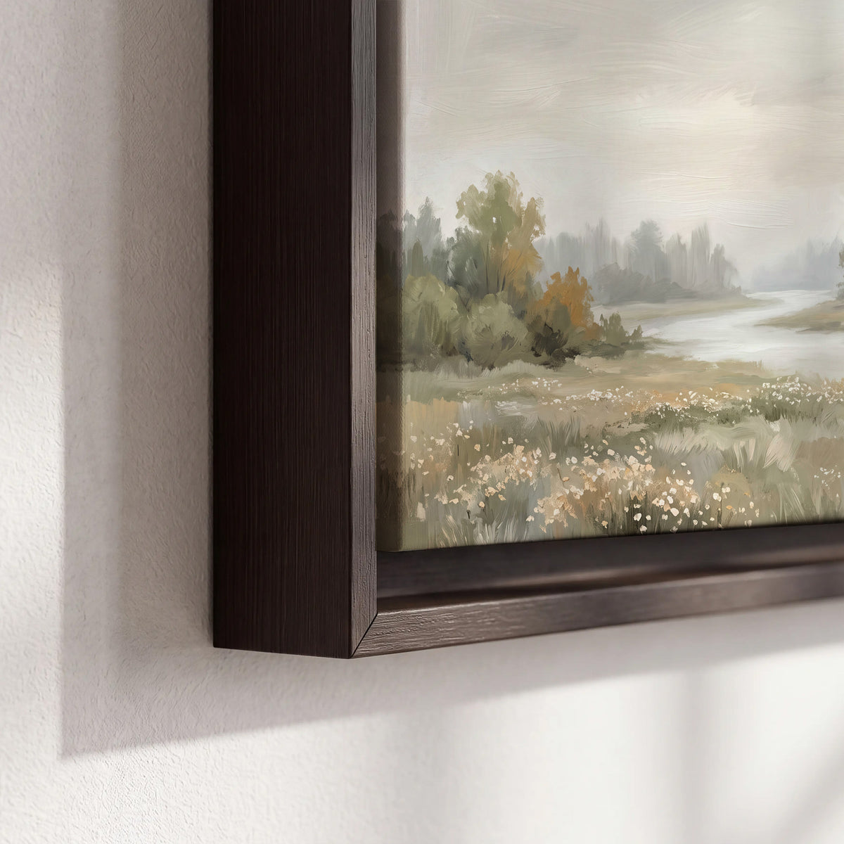 A broad pale river bordered by green trees and small meadow flowers 3 piece framed canvas wall art material and edge close up