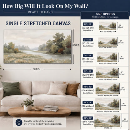 A broad pale river bordered by green trees and small meadow flowers single canvas wall art size guide above a sofa; room view is illustrative