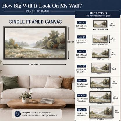 A broad pale river bordered by green trees and small meadow flowers single framed canvas wall art size guide above a sofa; room view is illustrative
