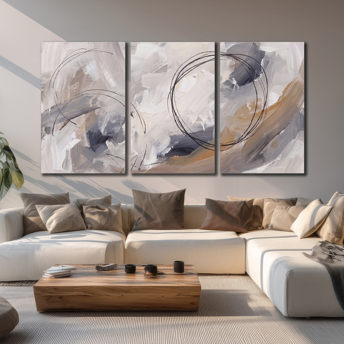 Expressive gray and cream abstract forms with fine gold-colored circular lines 3 piece canvas wall art displayed in a living room