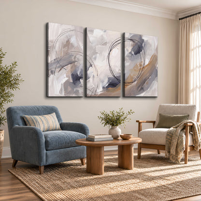 Expressive gray and cream abstract forms with fine gold-colored circular lines 3 piece canvas wall art styled in an interior