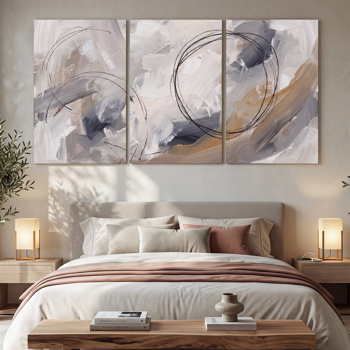 Expressive gray and cream abstract forms with fine gold-colored circular lines 3 piece canvas wall art displayed in a bedroom
