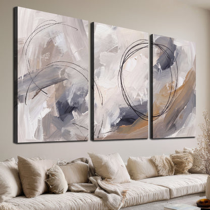 Expressive gray and cream abstract forms with fine gold-colored circular lines 3 piece canvas wall art room and product view