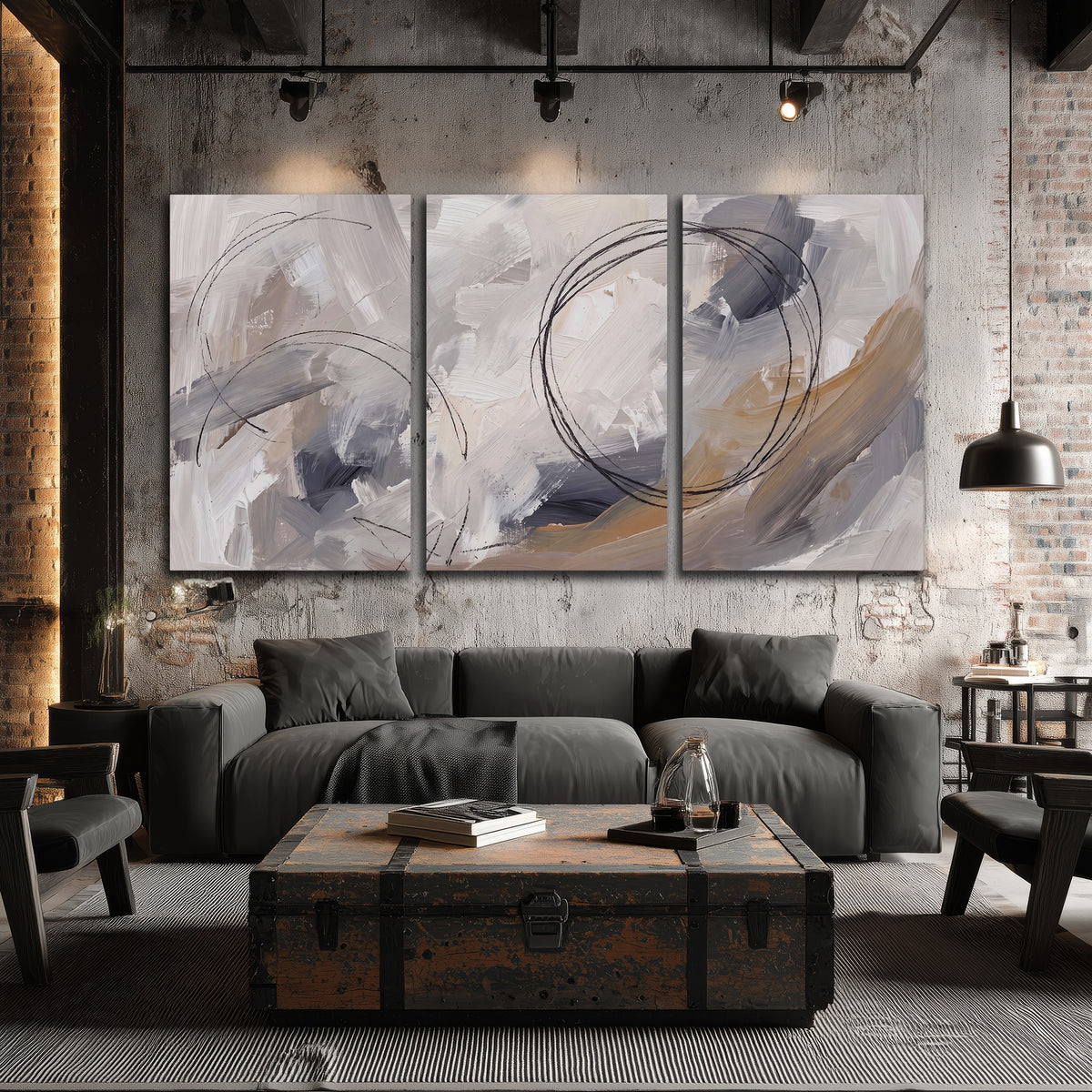 Expressive gray and cream abstract forms with fine gold-colored circular lines 3 piece canvas wall art displayed in a industrial room