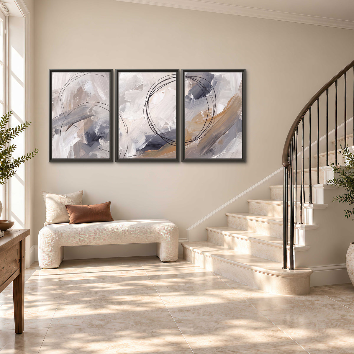 Expressive gray and cream abstract forms with fine gold-colored circular lines 3 piece framed canvas wall art styled in an interior
