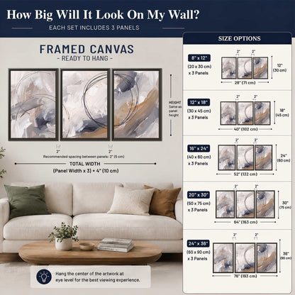 Expressive gray and cream abstract forms with fine gold-colored circular lines 3 piece framed canvas wall art size guide above a sofa; room view is illustrative