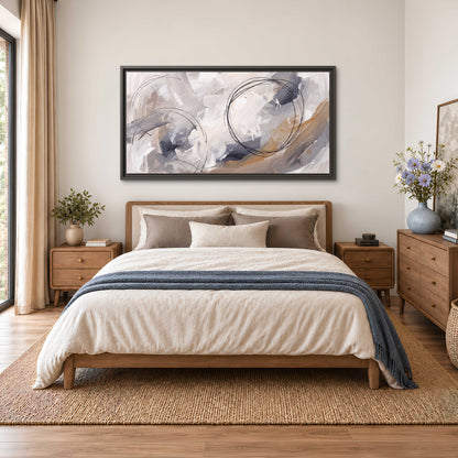 Expressive gray and cream abstract forms with fine gold-colored circular lines single framed canvas wall art styled in an interior