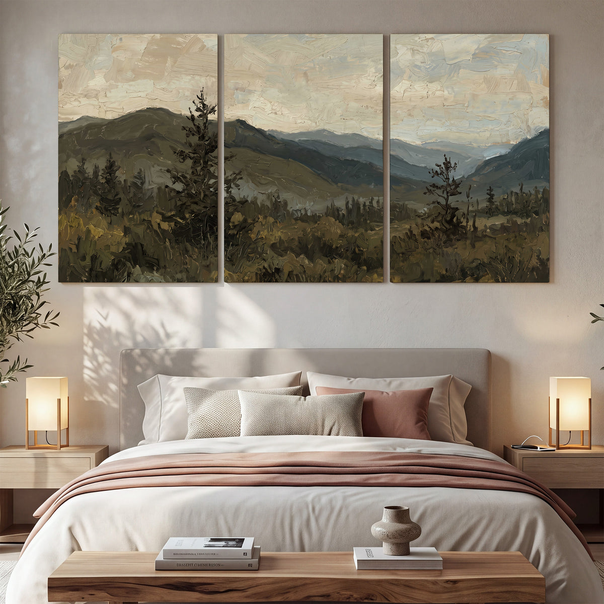 Layered mountain ridges and dark evergreen trees beneath a muted cloudy sky 3 piece canvas wall art displayed in a bedroom