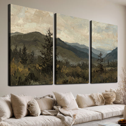 Layered mountain ridges and dark evergreen trees beneath a muted cloudy sky 3 piece canvas wall art room and product view